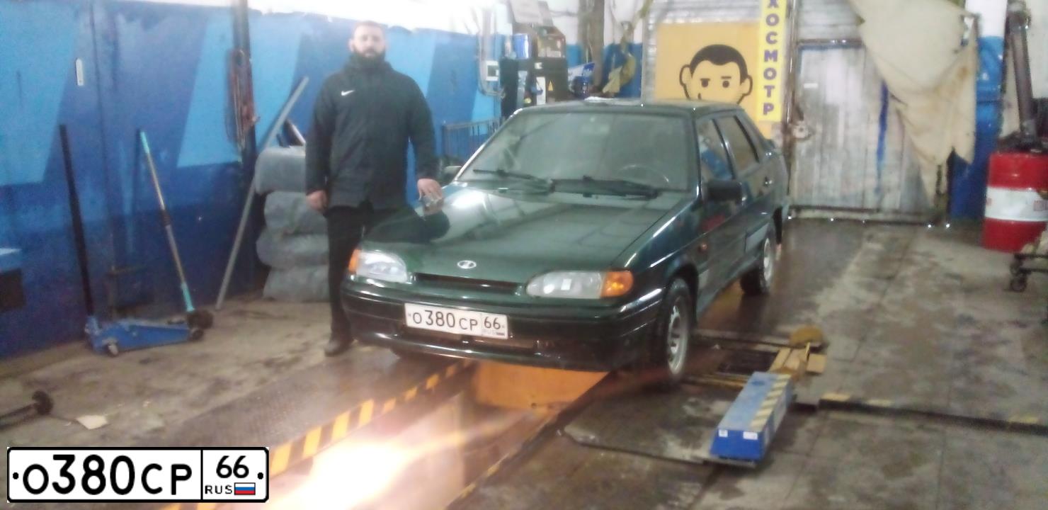 Фото автомобиля LADA 2115 SAMARA, 2003 — госномер О100ВТ774. Цвет: ТЕМНО-ЗЕЛЕНЫЙ