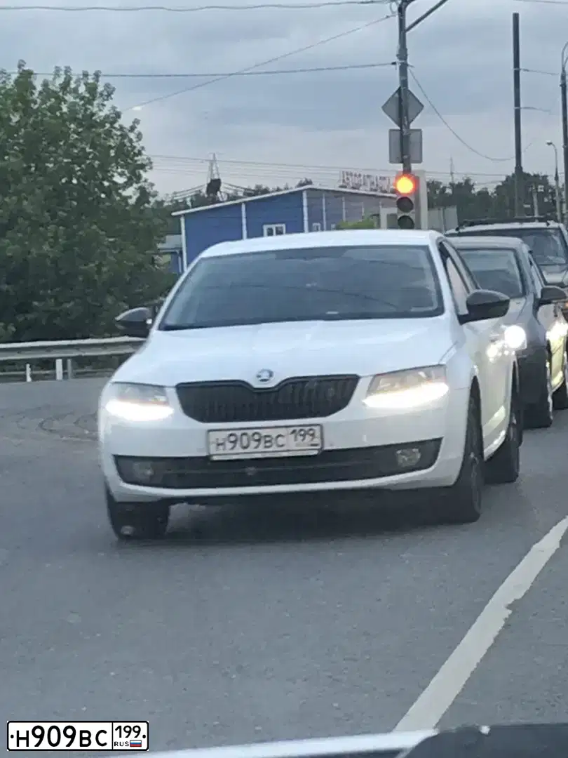 Фото автомобиля MAZDA 3, 2008 — госномер Н909ВС199. Цвет: ЧЕРНЫЙ