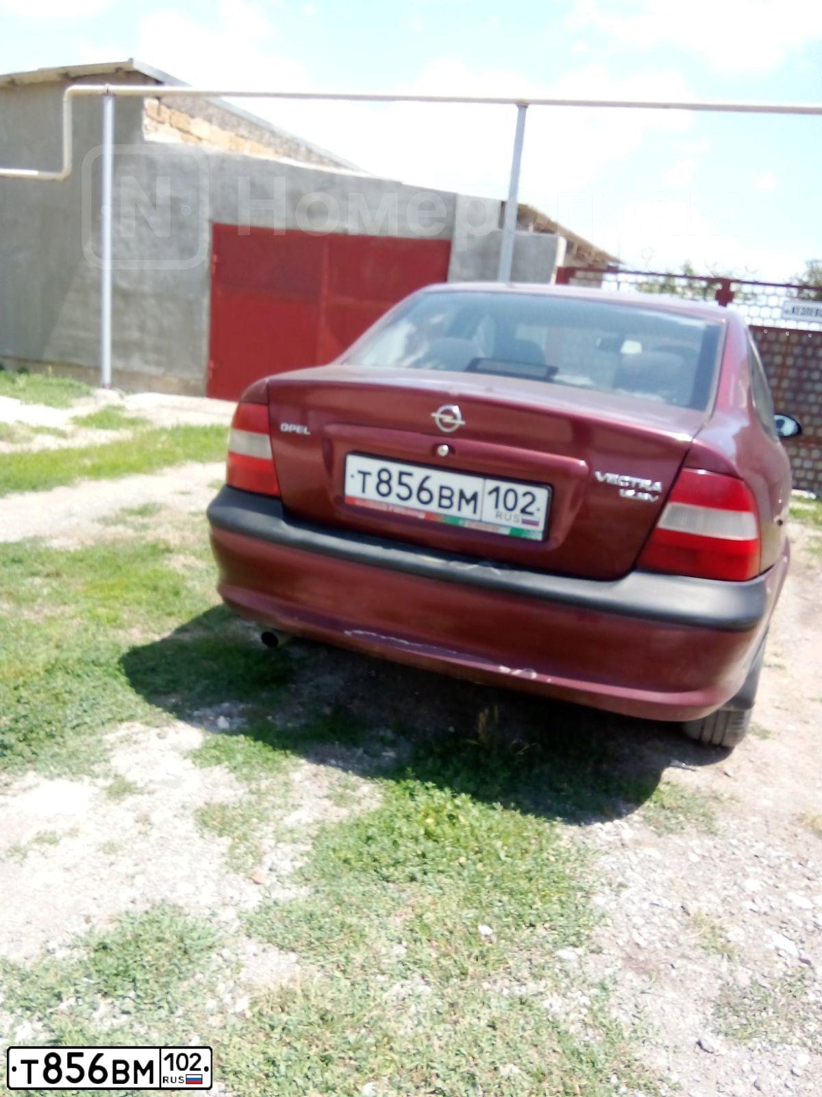 Фото автомобиля OPEL VECTRA, 1998 — госномер Т856ВМ102. Цвет: БОРДОВЫЙ