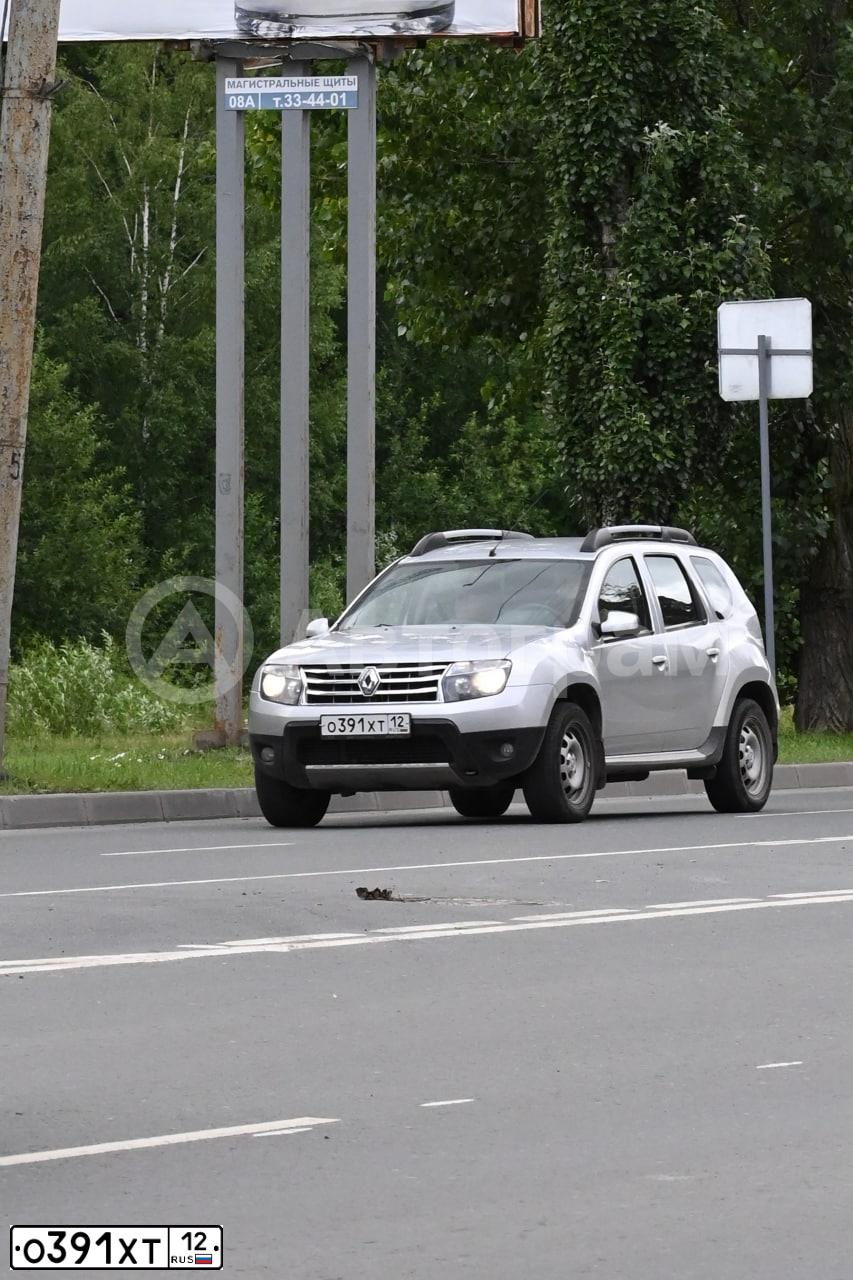 Фото автомобиля RENAULT DUSTER, 2014 — госномер О391ХТ12. Цвет: СВЕТЛО-СЕРЫЙ