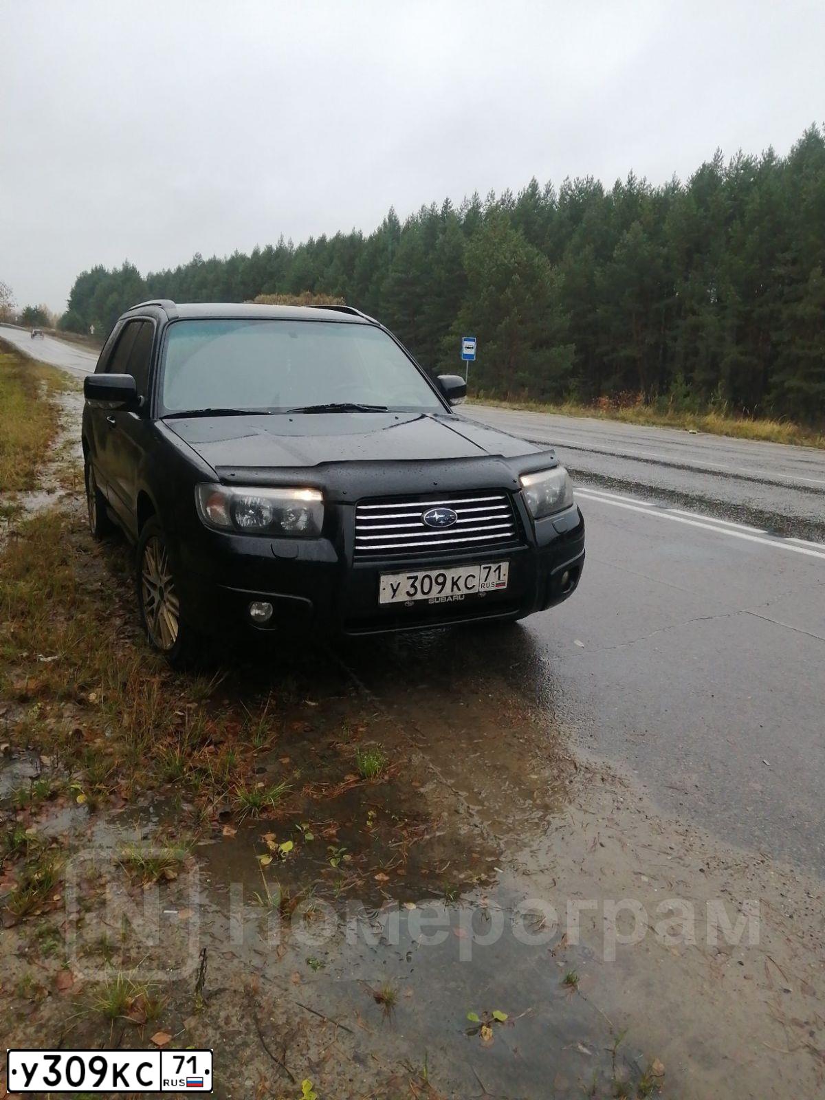 Фото автомобиля SUBARU FORESTER, 2007 — госномер У309КС71. Цвет: ЧЕРНЫЙ