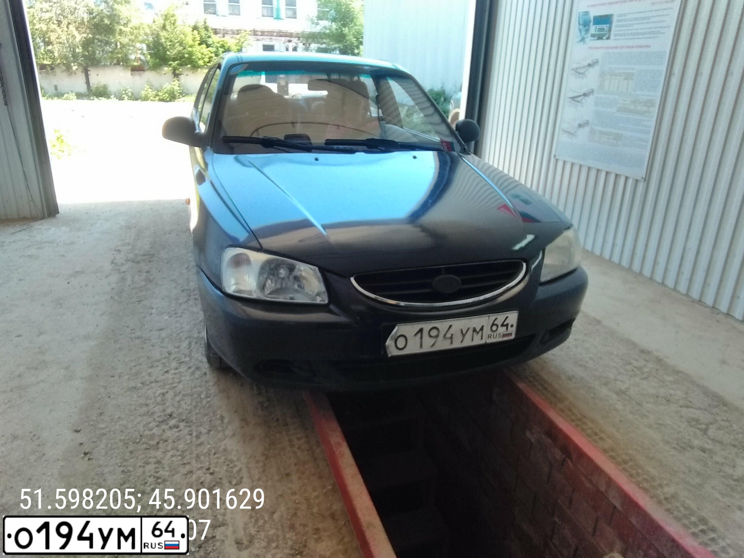 Фото автомобиля TAGAZ ACCENT, 2005 — госномер О194УМ64. Цвет: ЧЕРНЫЙ
