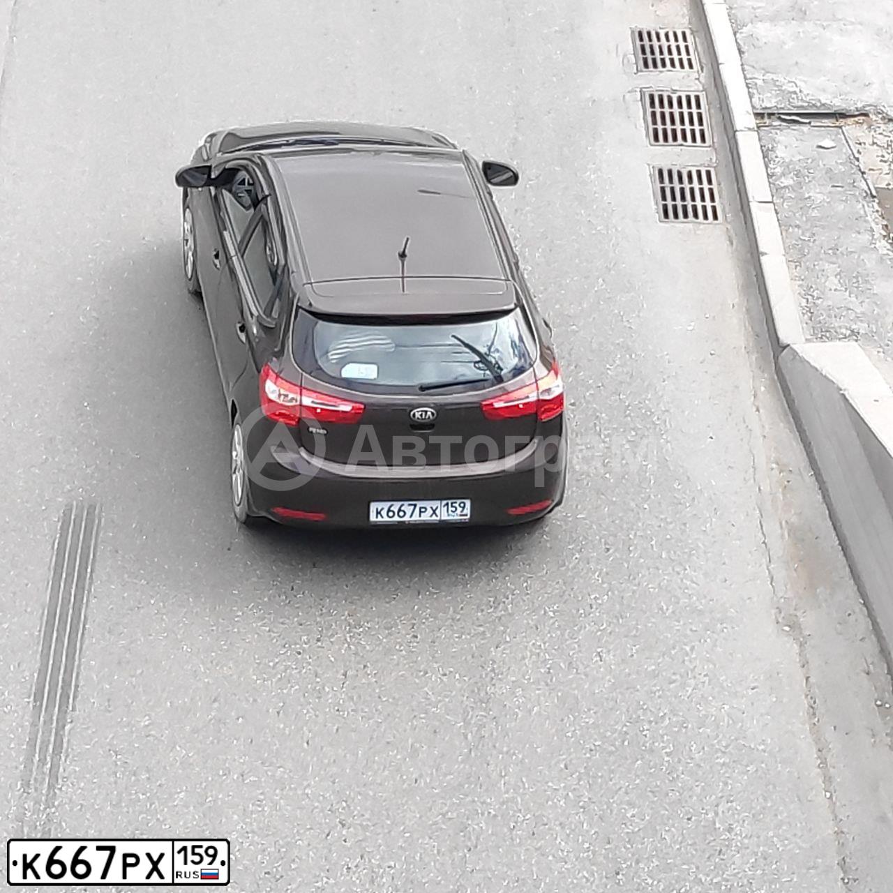 Фото автомобиля KIA RIO, 2014 — госномер У121МК163. Цвет: ЧЕРНЫЙ