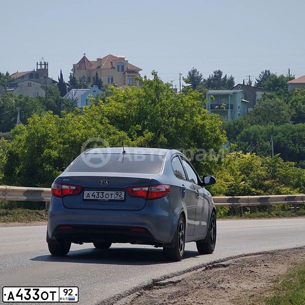Фото автомобиля KIA RIO, 2012 — госномер А433ОТ92. Цвет: ГОЛУБОЙ
