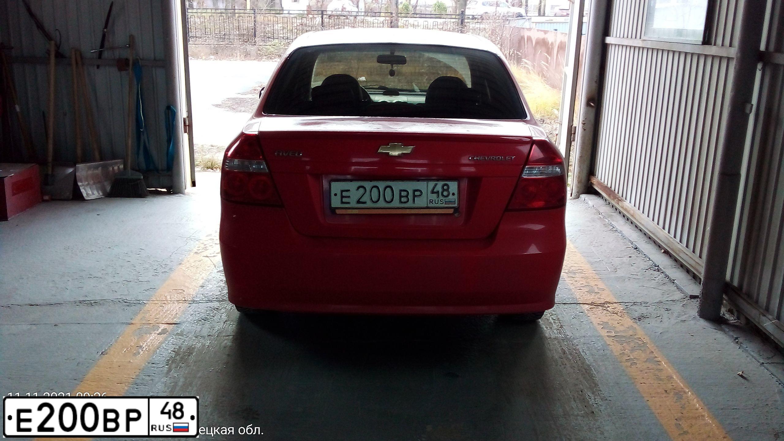 Фото автомобиля CHEVROLET AVEO, 2007 — госномер Е200ВР48. Цвет: Красный