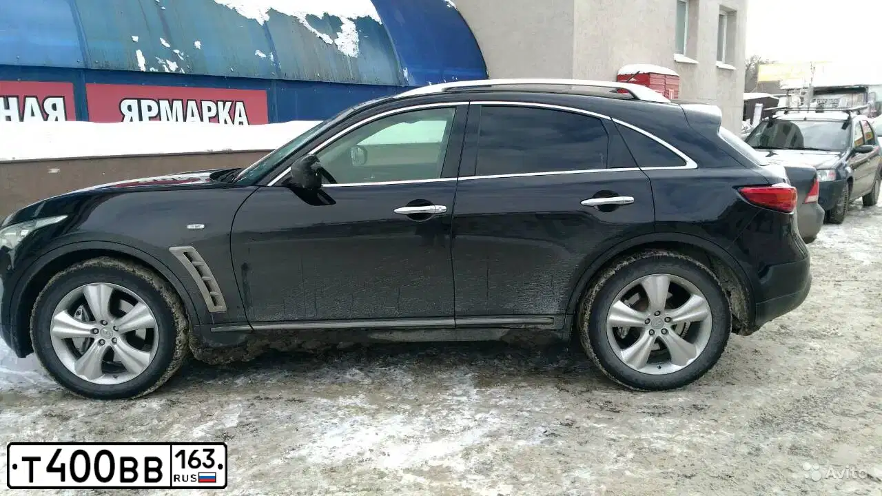 Фото автомобиля INFINITI QX70 /FX/, 2011 — госномер В113МР156. Цвет: ЧЕРНЫЙ