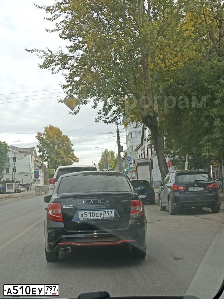 Фото автомобиля LADA GRANTA, 2021 — госномер Н760НО15. Цвет: ЧЕРНЫЙ