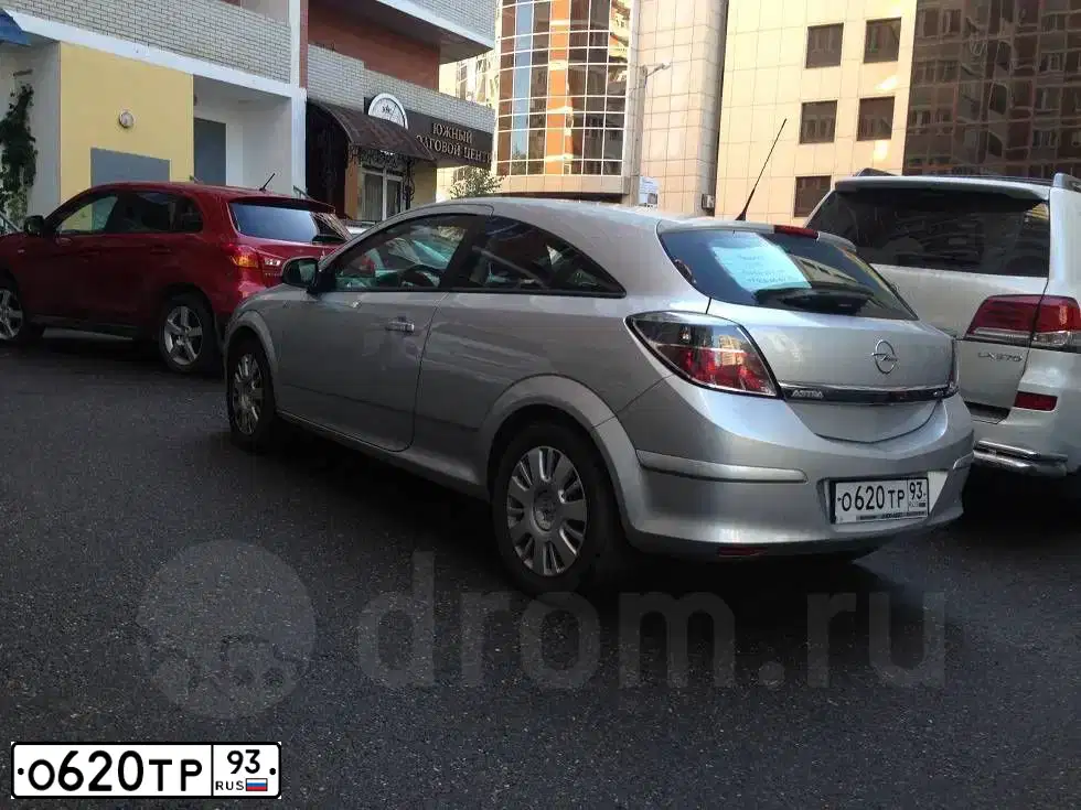 Фото автомобиля OPEL ASTRA, 2010 — госномер Х970УТ193. Цвет: Серебристый