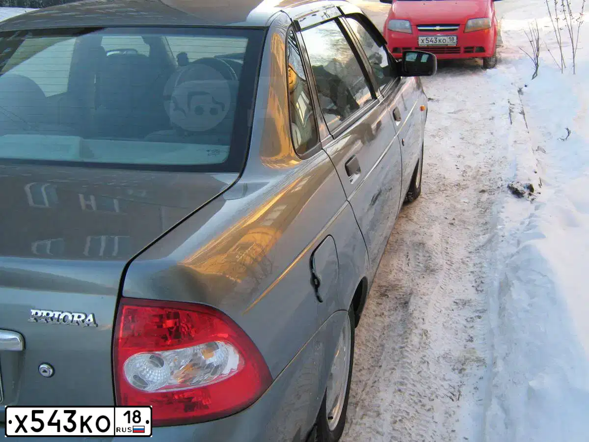 Фото автомобиля CHEVROLET AVEO, 2007 — госномер Х543КО18. Цвет: КРАСНЫЙ