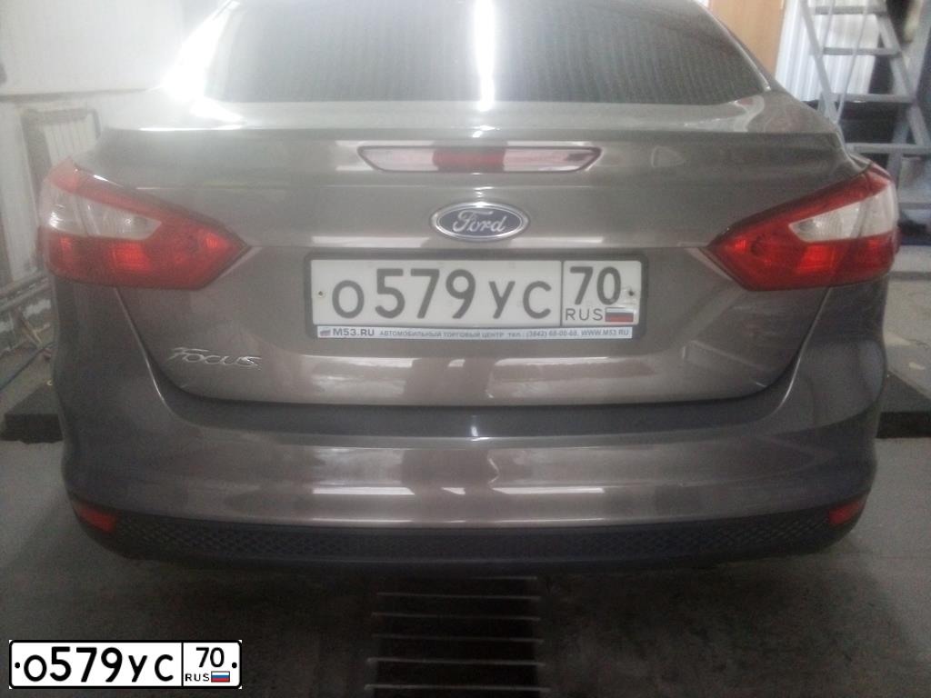 Фото автомобиля FORD FOCUS, 2011 — госномер О839МЕ142. Цвет: СЕРО-КОРИЧНЕВЫЙ