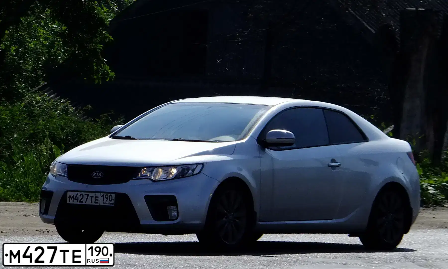 Фото автомобиля KIA CERATO, 2012 — госномер М427ТЕ190. Цвет: СЕРЫЙ