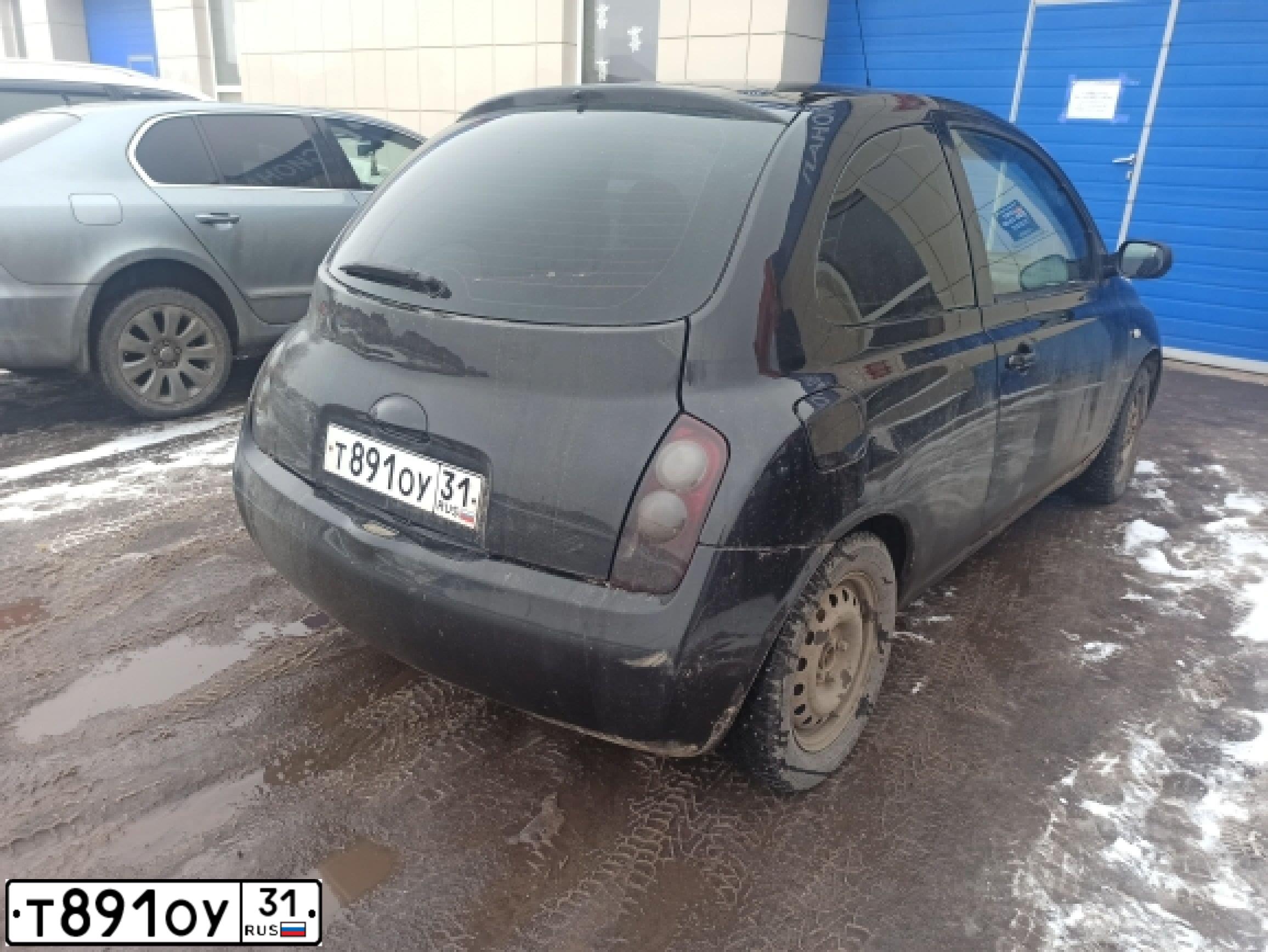 Фото автомобиля NISSAN MICRA, 2004 — госномер О151ВР31. Цвет: ЧЕРНЫЙ