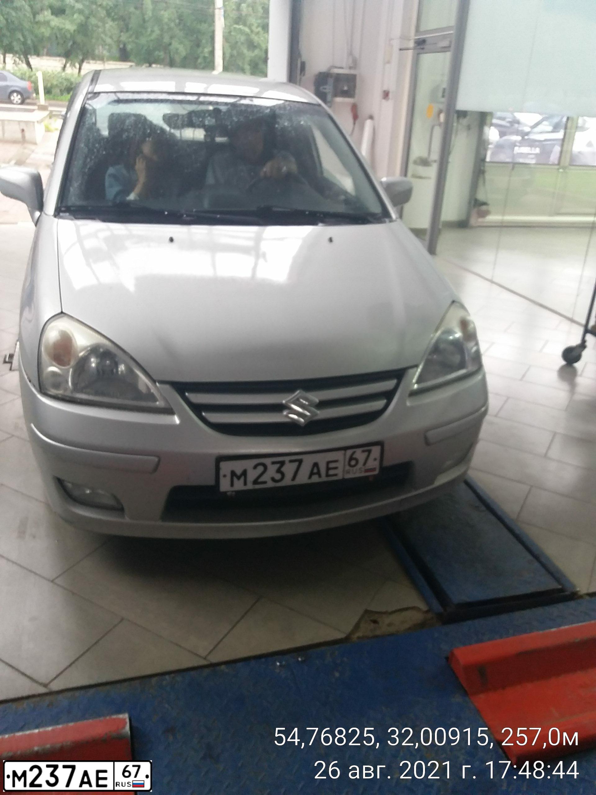 Фото автомобиля SUZUKI LIANA, 2007 — госномер М237АЕ67. Цвет: Серебристый