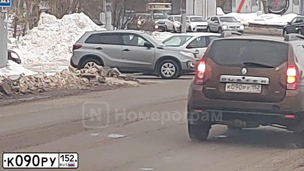 Фото автомобиля RENAULT DUSTER, 2012 — госномер К090РУ152. Цвет: Коричневый