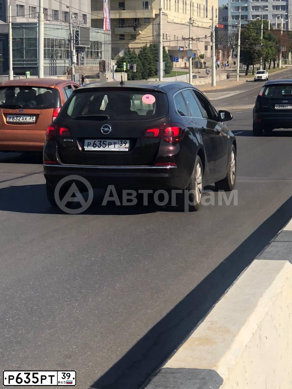Фото автомобиля OPEL ASTRA SPORTS TOURER, 2013 — госномер Т068НМ39