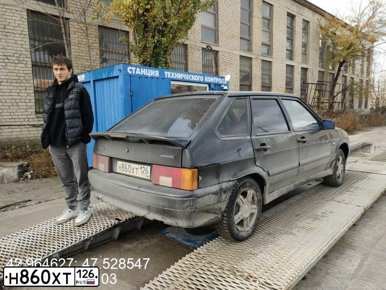 Фото автомобиля LADA 2114 SAMARA, 2009 — госномер Н262МК26. Цвет: СИНЕ-ЧЕРНЫЙ