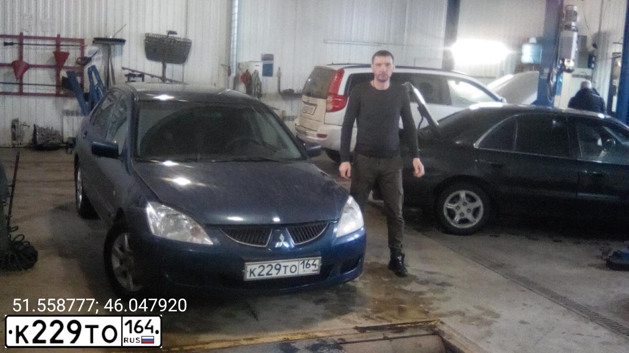 Фото автомобиля MITSUBISHI LANCER, 2005 — госномер К229ТО164. Цвет: синий