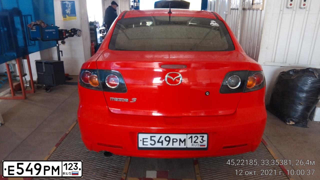 Фото автомобиля MAZDA 3, 2008 — госномер В390ВМ199. Цвет: КРАСНЫЙ