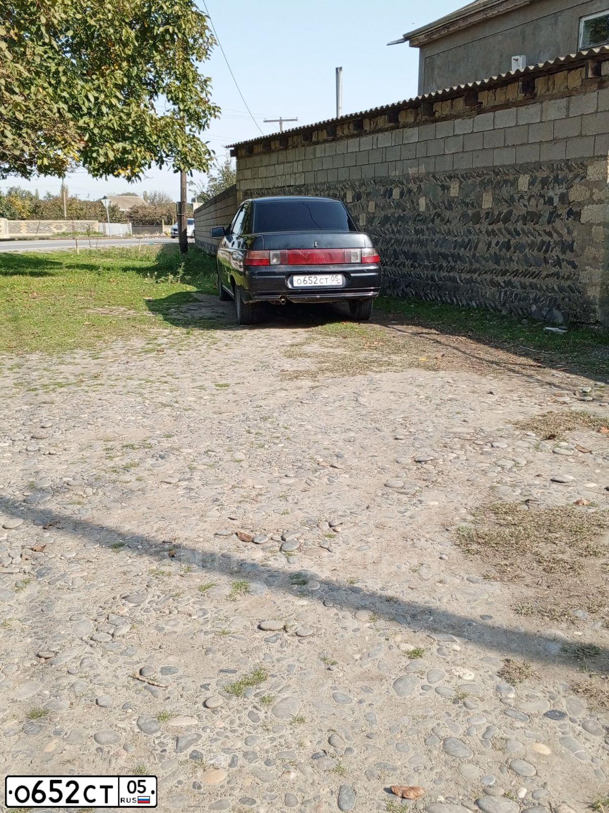 Фото автомобиля LADA 2110 LADA, 2006 — госномер О652СТ05. Цвет: ЧЕРНЫЙ