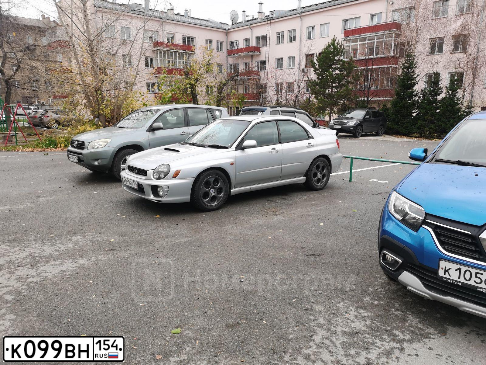 Фото автомобиля SUBARU IMPREZA, 2001 — госномер К099ВН154. Цвет: СЕРЕБРИСТЫЙ