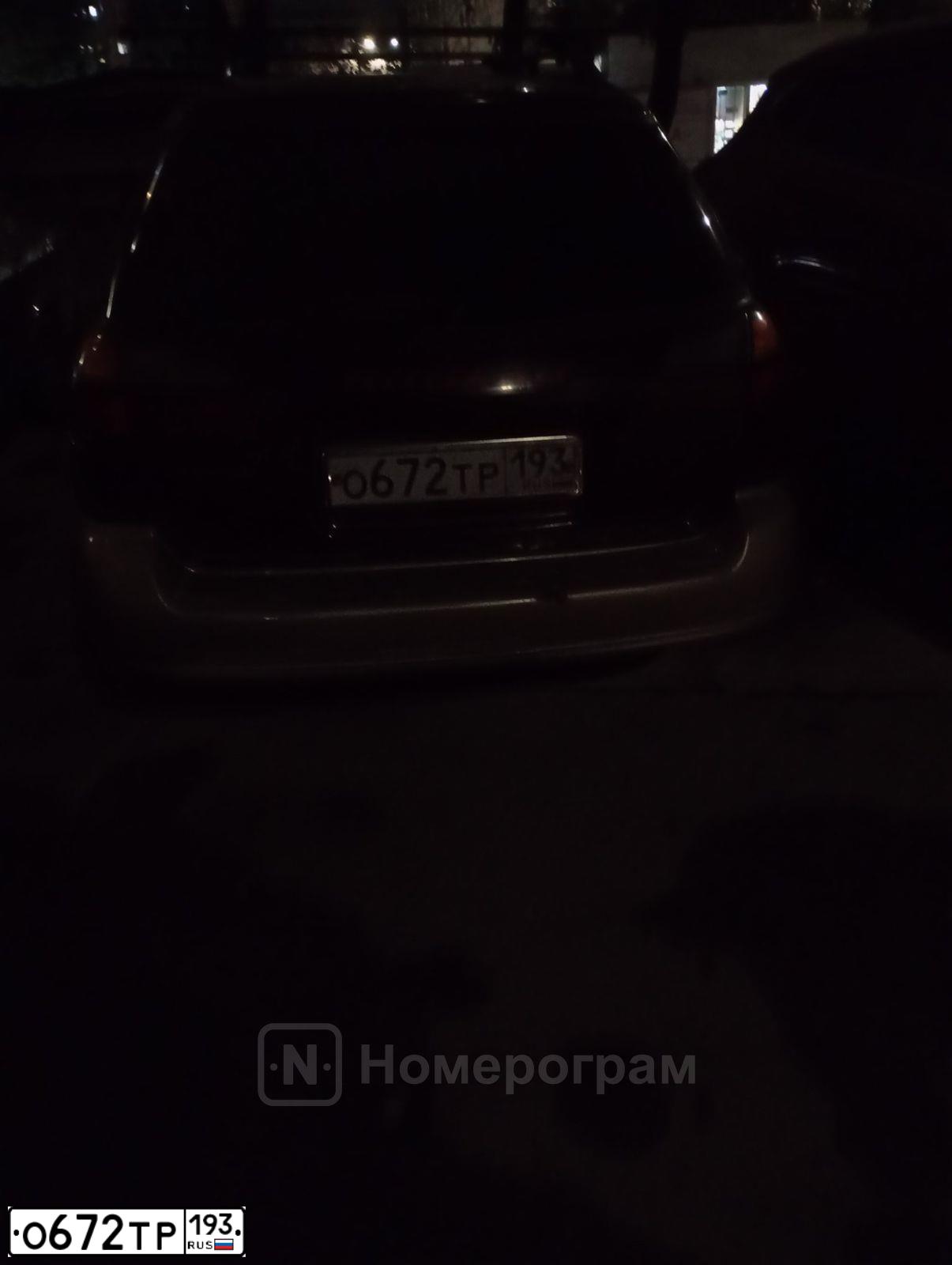 Фото автомобиля SUBARU OUTBACK, 1999 — госномер О446ХТ161. Цвет: Красный