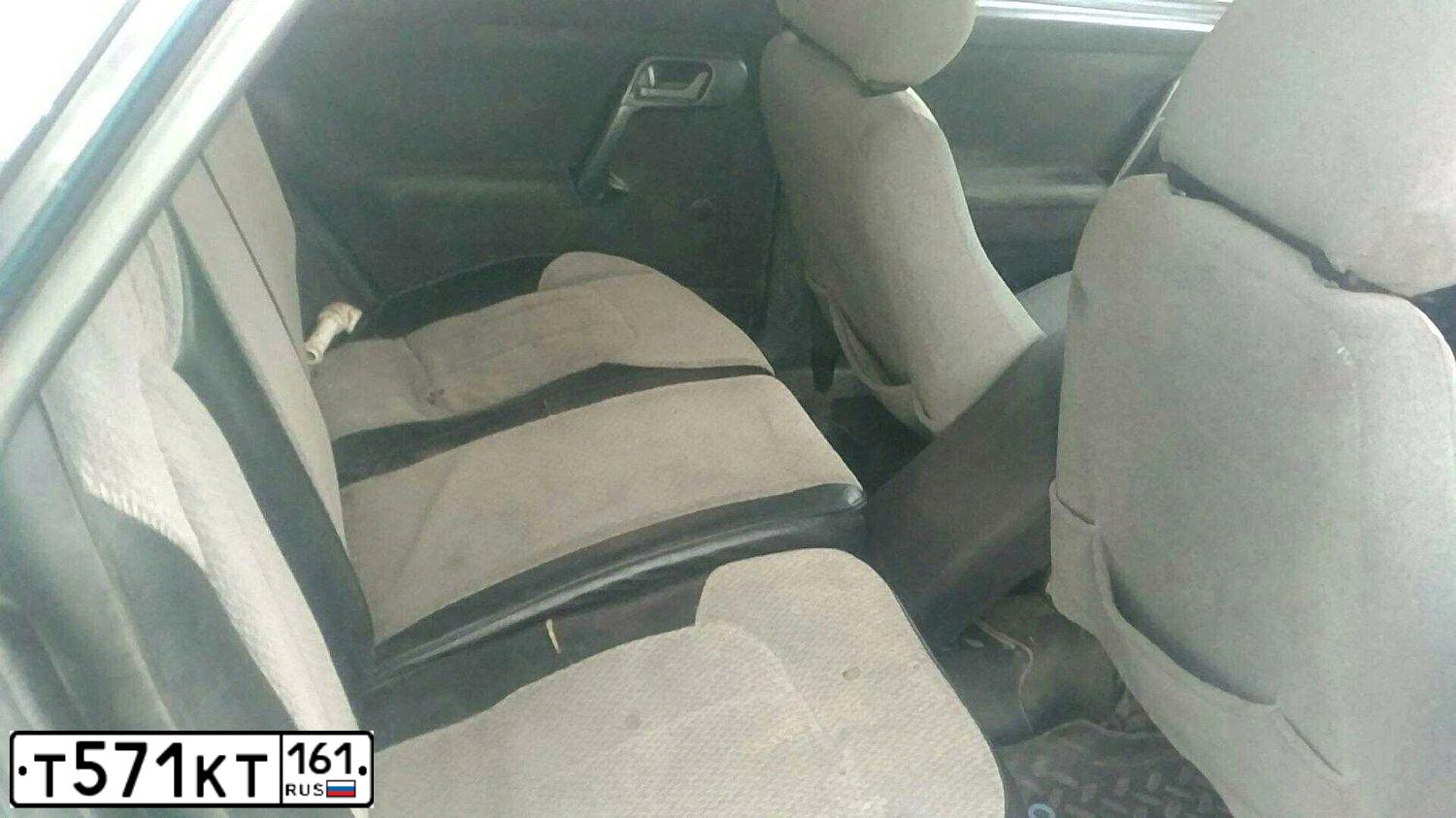 Фото автомобиля LADA 2112, 2001 — госномер Т571КТ161. Цвет: СЕРЕБ.ЗЕЛЕНЫЙ