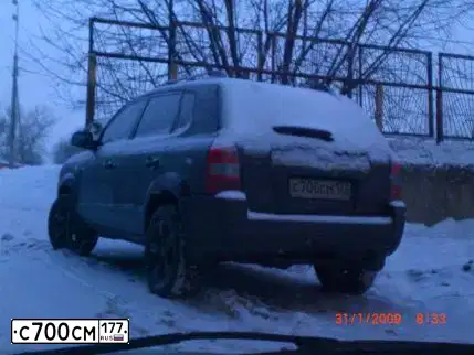 Фото автомобиля HYUNDAI TUCSON, 2007 — госномер С016ОУ40. Цвет: ЧЕРНЫЙ