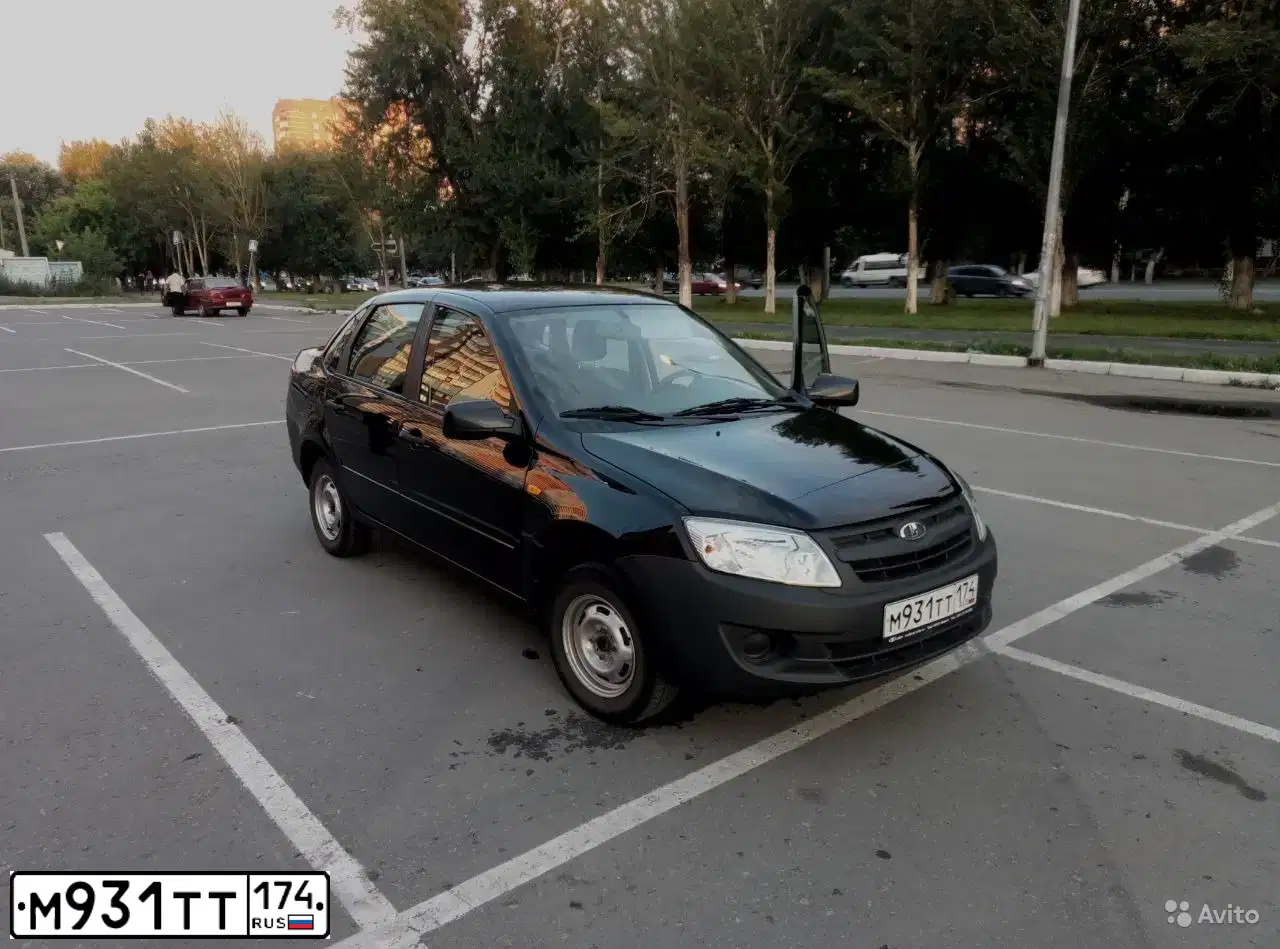 Фото автомобиля LADA 2190 GRANTA, 2016 — госномер М931ТТ174. Цвет: ЧЕРНЫЙ