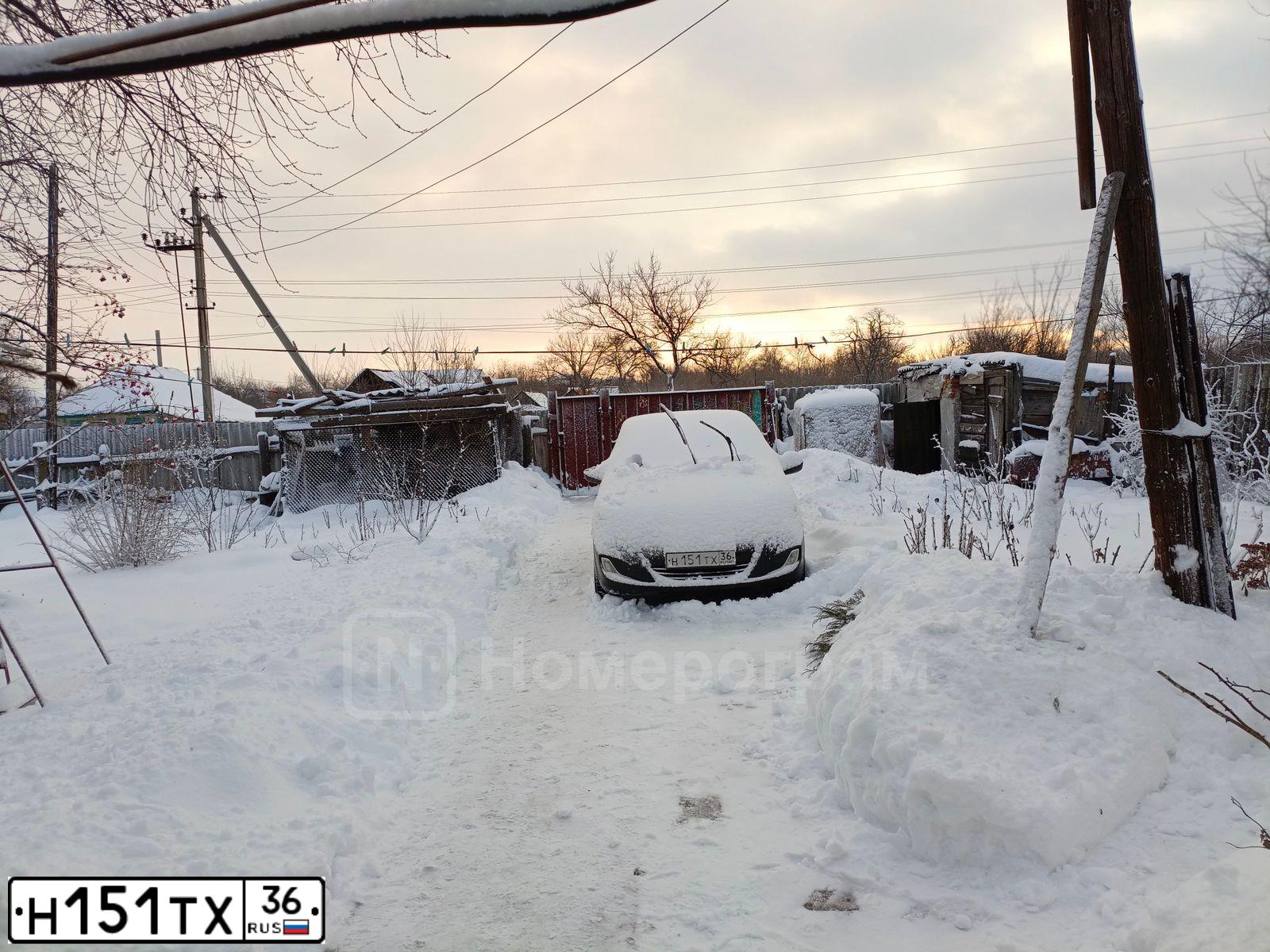 Фото автомобиля HYUNDAI SOLARIS, 2011 — госномер Н040ЕВ181. Цвет: ЧЕРНЫЙ
