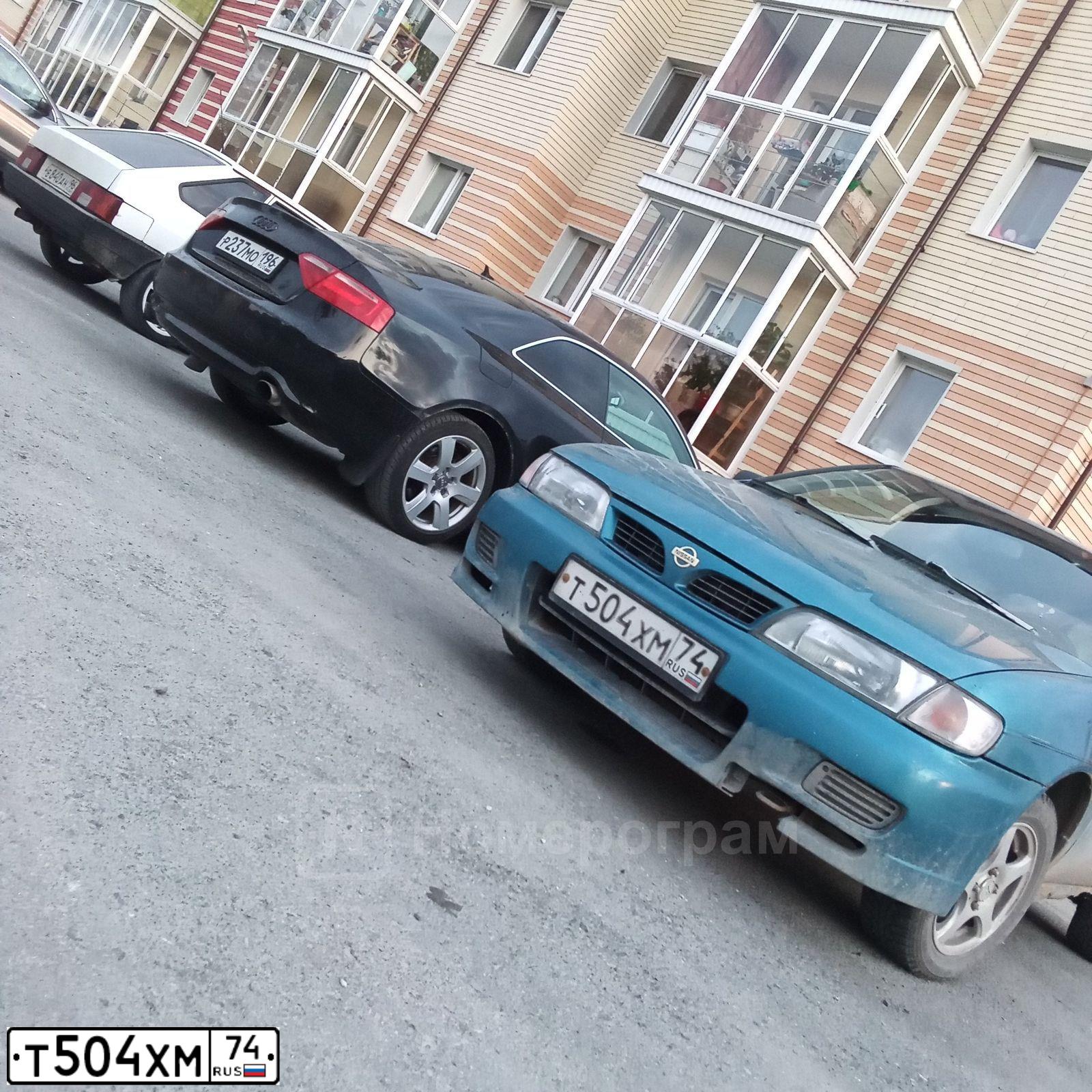 Фото автомобиля NISSAN ALMERA, 1995 — госномер Т504ХМ74. Цвет: СИНИЙ