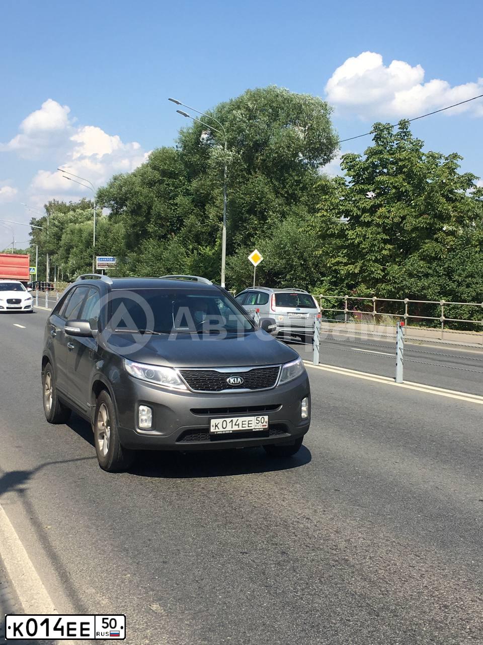 Фото автомобиля LADA 2107, 1995 — госномер К014ЕЕ50. Цвет: БЕЛЫЙ