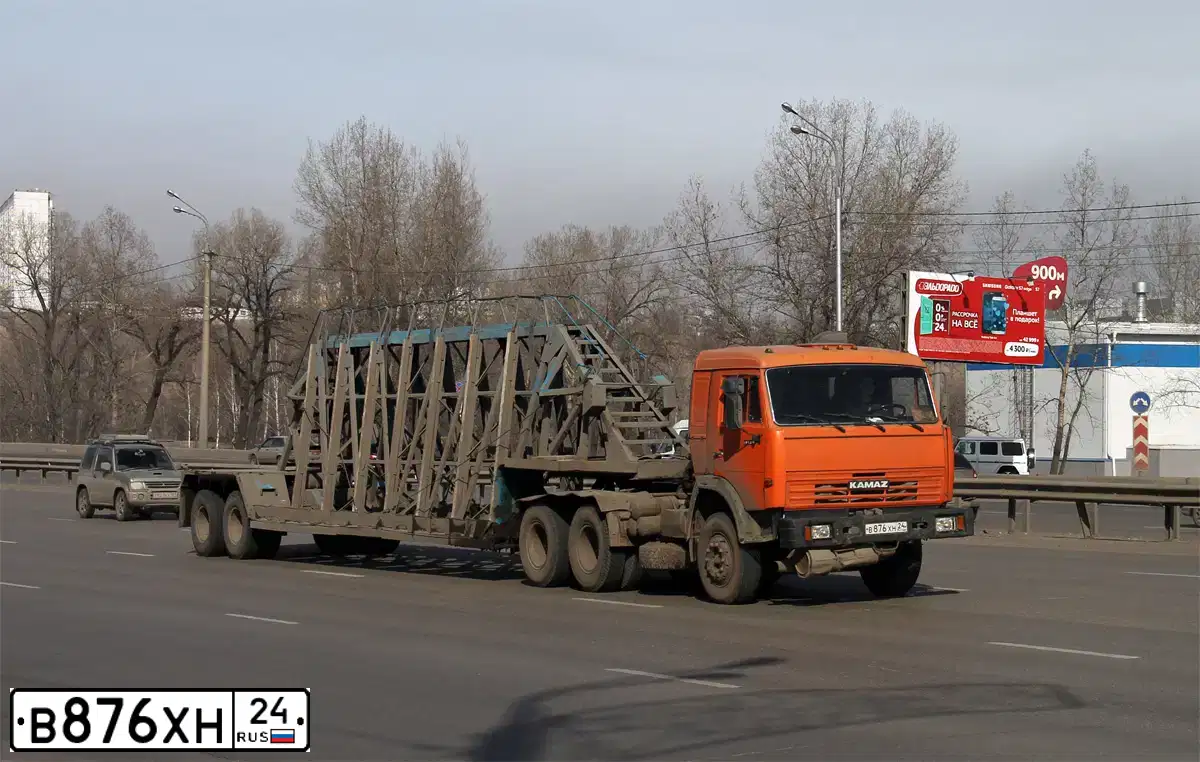 Фото автомобиля KAMAZ 54115 /6X4/, 2007 — госномер В876ХН24. Цвет: ОРАНЖЕВЫЙ