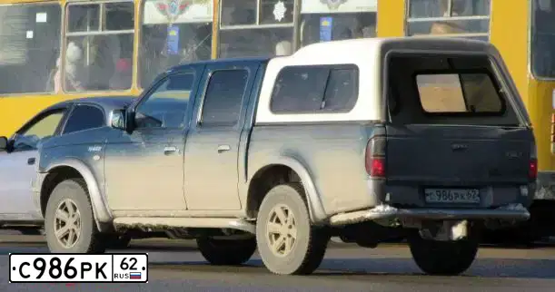 Фото автомобиля FORD RANGER, 2005 — госномер С424ЕМ58. Цвет: ЗЕЛЕНЫЙ