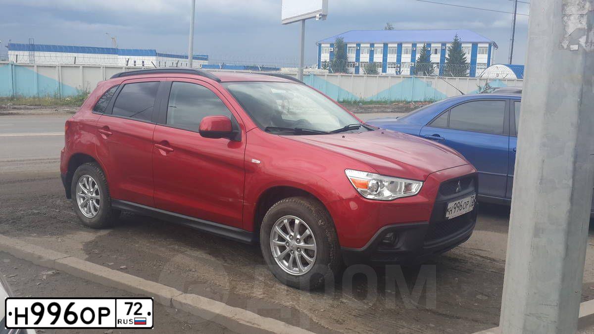 Фото автомобиля MITSUBISHI ASX, 2010 — госномер С831СА89. Цвет: Красный