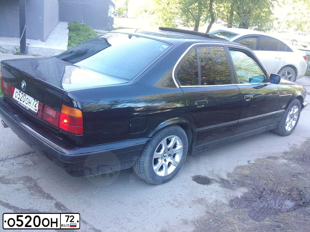 Фото автомобиля BMW W SERIE 5, 1995 — госномер О520ОН72. Цвет: ЧЕРНЫЙ
