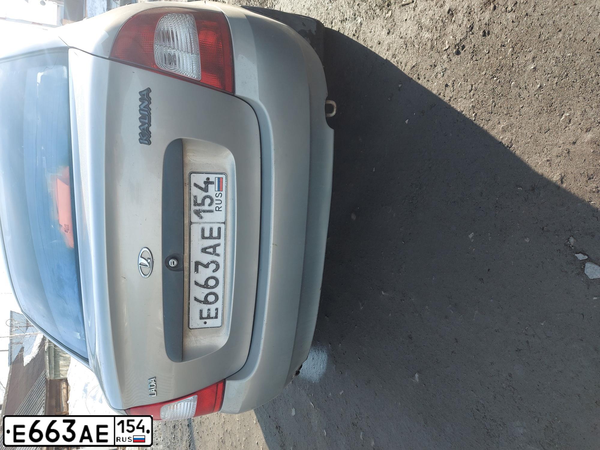 Фото автомобиля LADA KALINA, 2005 — госномер Е952ЕС122. Цвет: БЕЖЕВО-СЕРЫЙ