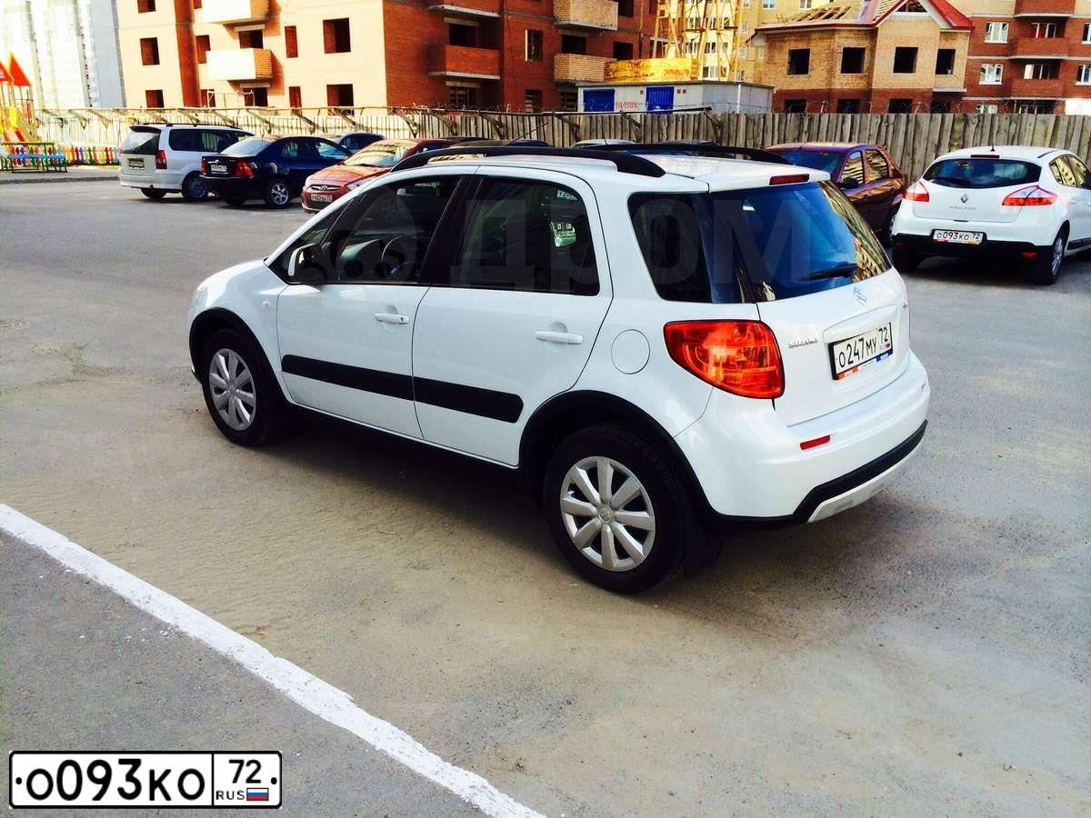 Фото автомобиля RENAULT MEGANE, 2011 — госномер О093КО72. Цвет: Белый