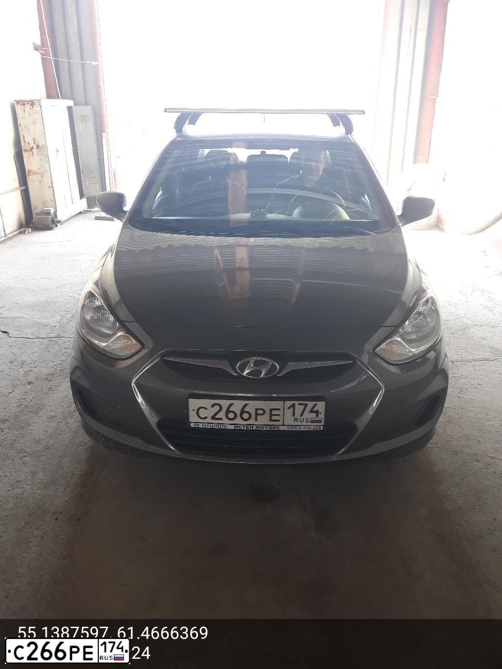 Фото автомобиля HYUNDAI SOLARIS, 2012 — госномер С266РЕ174. Цвет: ЧЕРНО-СЕРЫЙ