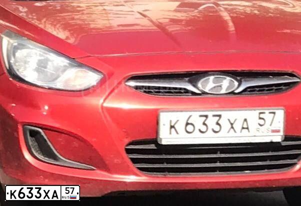 Фото автомобиля HYUNDAI SOLARIS, 2012 — госномер К700ОС57. Цвет: КРАСНЫЙ ГРАНАТ