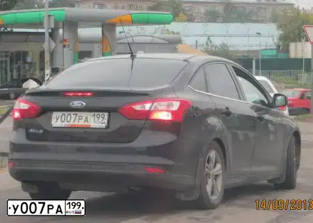 Фото автомобиля FORD FOCUS, 2011 — госномер Е213УЕ750. Цвет: ЧЕРНЫЙ
