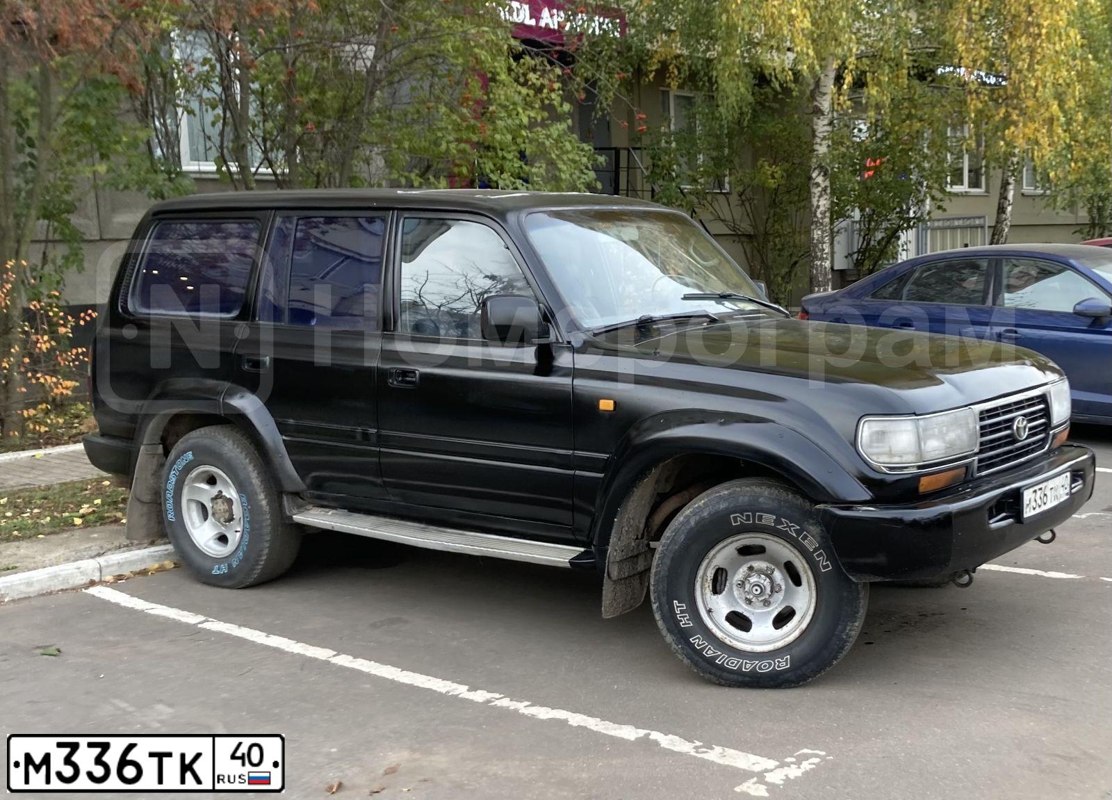 Фото автомобиля TOYOTA LANDCRUISER, 1997 — госномер М336ТК40. Цвет: ЧЕРНЫЙ