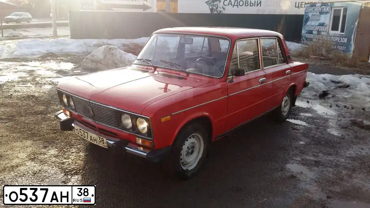 Фото автомобиля LADA 2106, 1995 — госномер О537АН38. Цвет: РУБИН