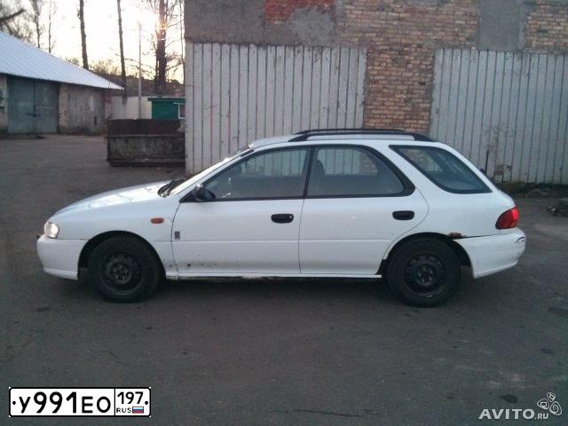 Фото автомобиля SUBARU IMPREZA, 1999 — госномер Е522КМ199. Цвет: Белый