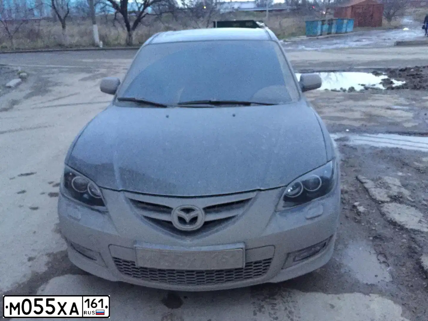 Фото автомобиля MAZDA 3, 2006 — госномер М055ХА161. Цвет: ЧЕРНЫЙ