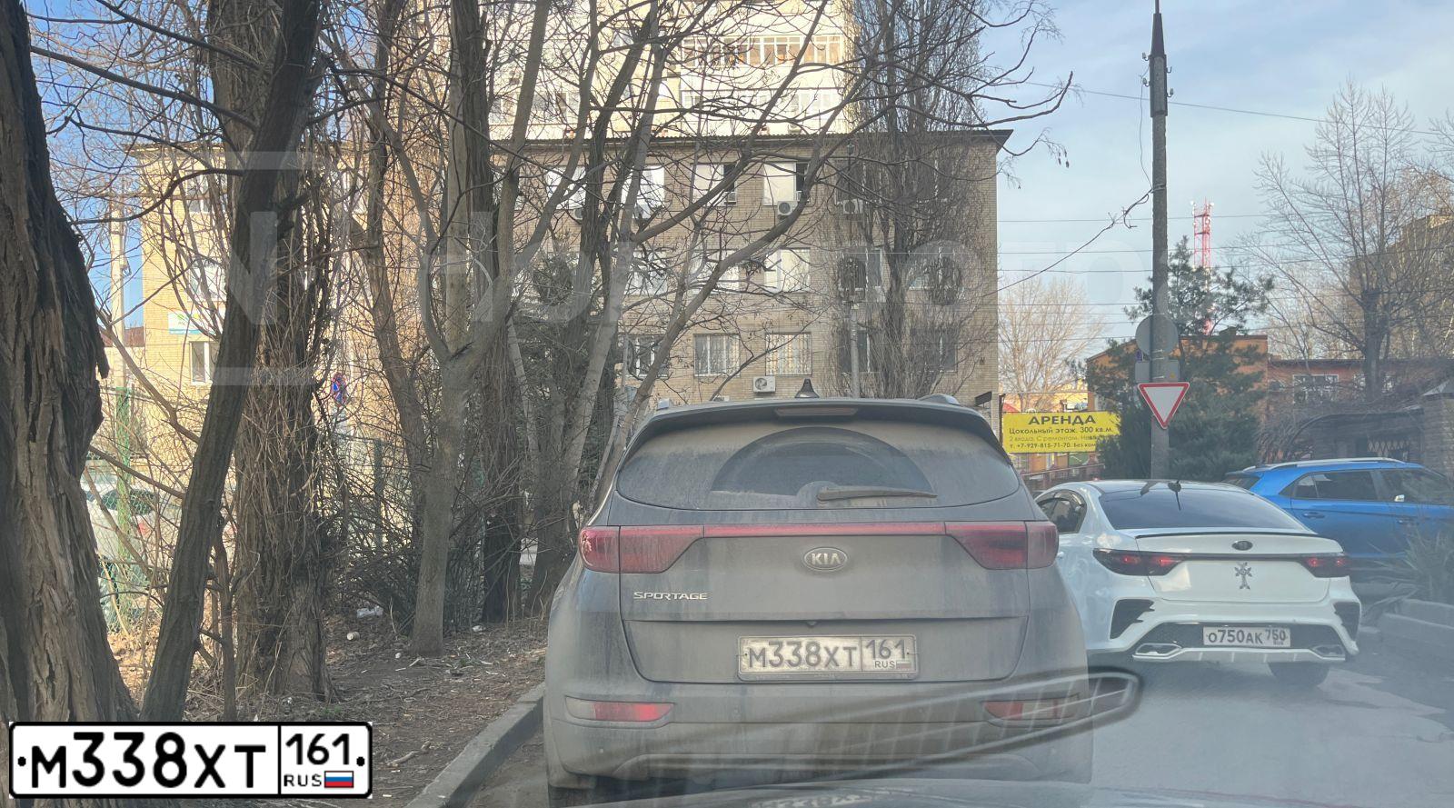Фото автомобиля KIA SPORTAGE, 2017 — госномер М338ХТ161. Цвет: Серый
