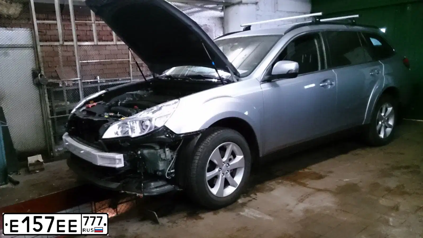 Фото автомобиля INFINITI I QX80 QX56, 2012 — госномер Е157ЕЕ777. Цвет: ЧЕРНЫЙ