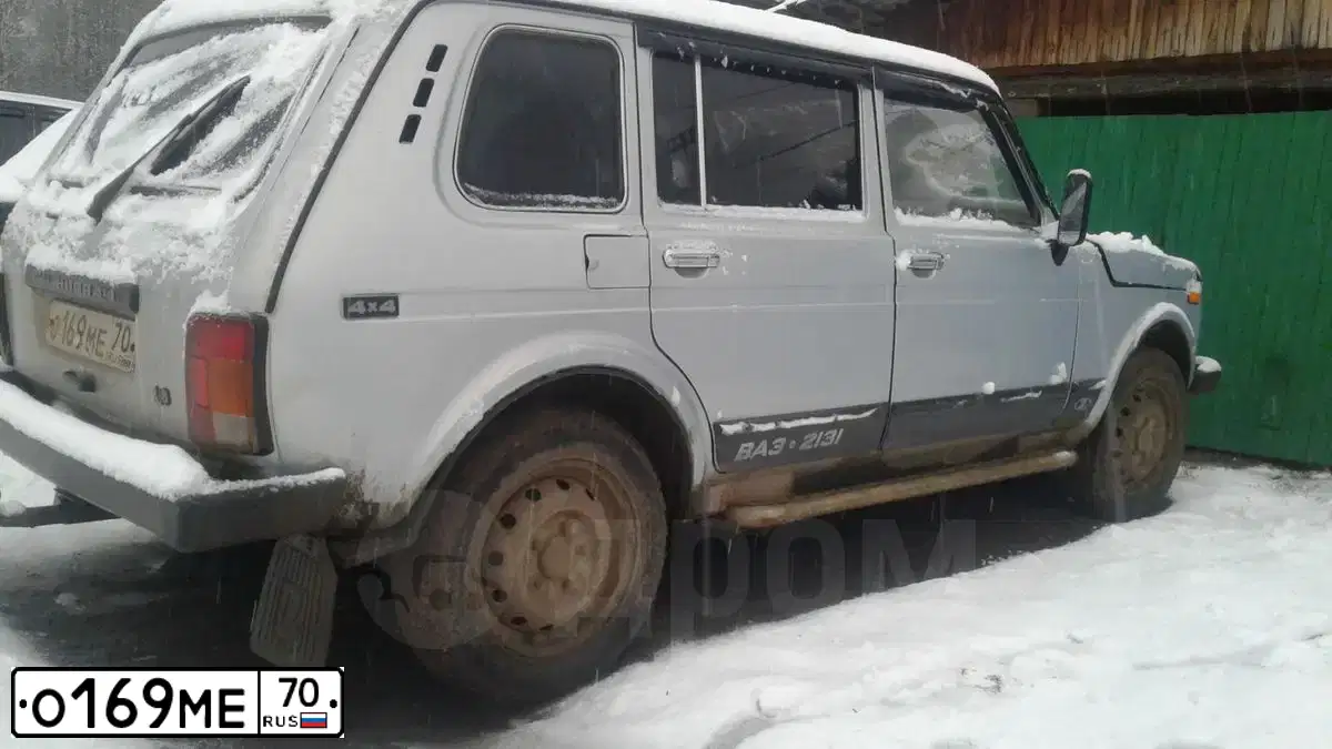 Фото автомобиля LADA 2131 NIVA, 2004 — госномер О169МЕ70. Цвет: серебристый