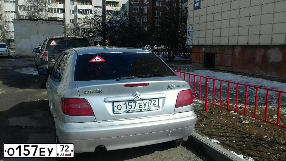 Фото автомобиля CITROEN XSARA, 2001 — госномер О157ЕУ72. Цвет: СВЕТЛО-СЕРЫЙ