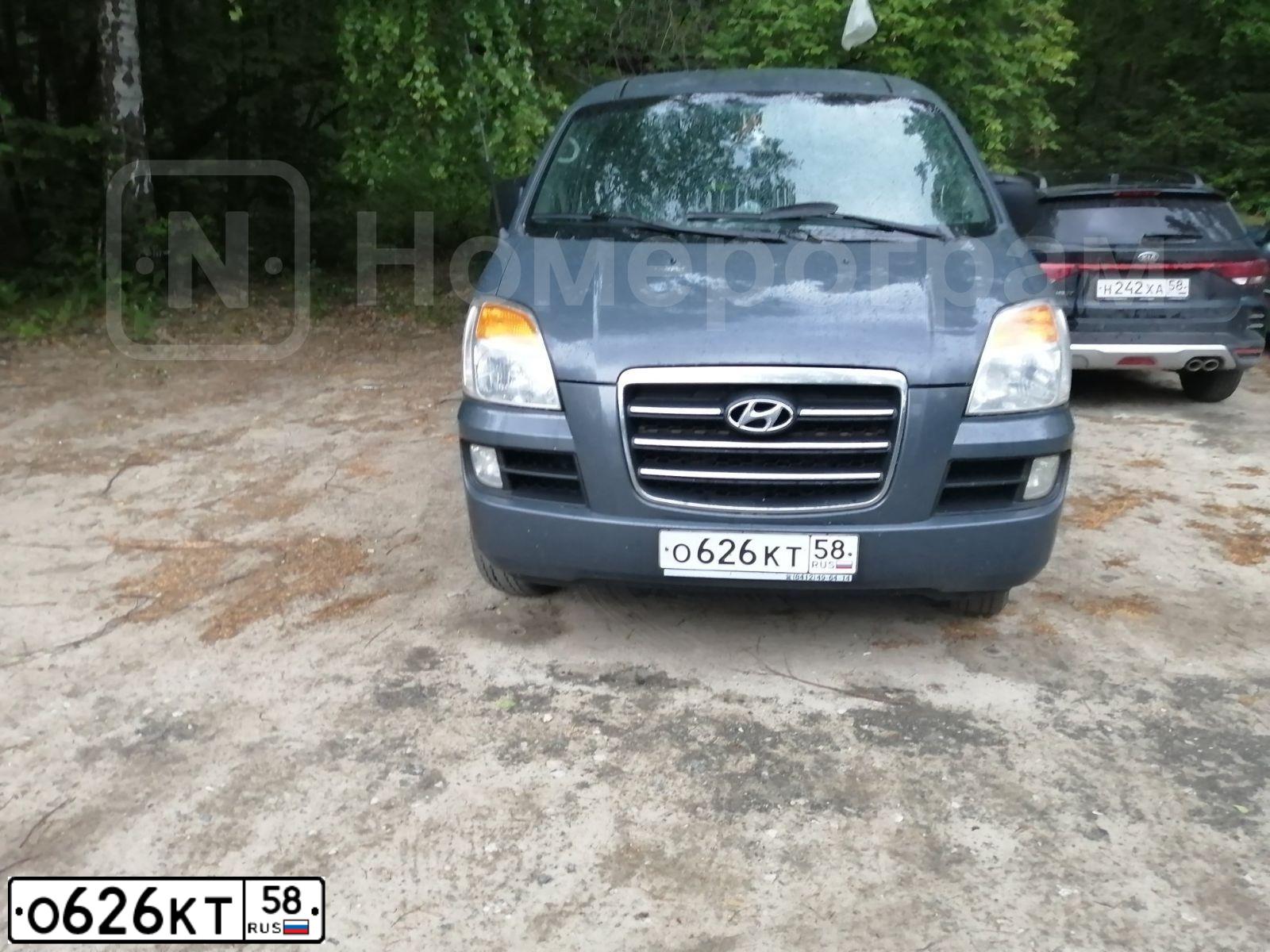 Фото автомобиля HYUNDAI H 1/H 100/STAREX, 2006 — госномер О626КТ58. Цвет: ТЕМНО-СЕРЫЙ