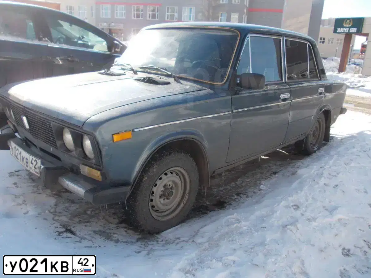 Фото автомобиля LADA 2106, 2000 — госномер Р965КУ142. Цвет: СЕРО-СИНИЙ